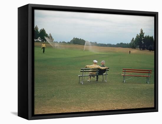 Golfers Sitting on Bench Near Practice Greens While Awaiting Tee Time on Pinehurst Golf Course-Walker Evans-Framed Premier Image Canvas