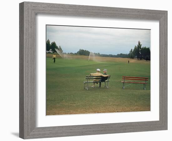 Golfers Sitting on Bench Near Practice Greens While Awaiting Tee Time on Pinehurst Golf Course-Walker Evans-Framed Photographic Print