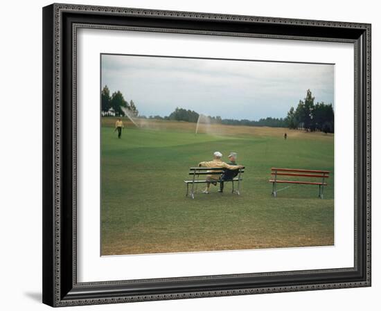 Golfers Sitting on Bench Near Practice Greens While Awaiting Tee Time on Pinehurst Golf Course-Walker Evans-Framed Photographic Print