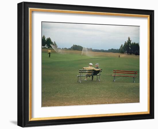 Golfers Sitting on Bench Near Practice Greens While Awaiting Tee Time on Pinehurst Golf Course-Walker Evans-Framed Photographic Print