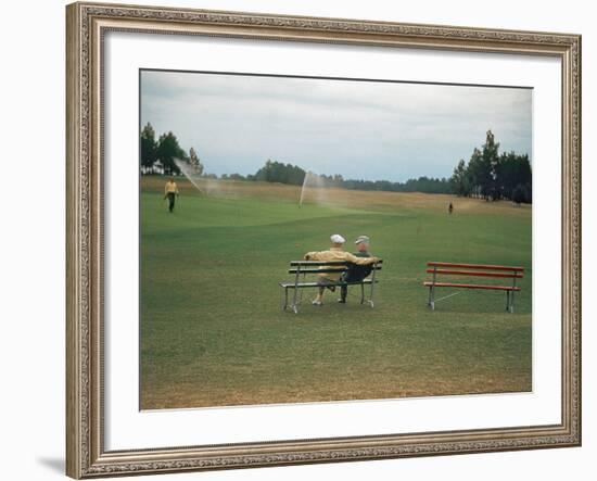 Golfers Sitting on Bench Near Practice Greens While Awaiting Tee Time on Pinehurst Golf Course-Walker Evans-Framed Photographic Print