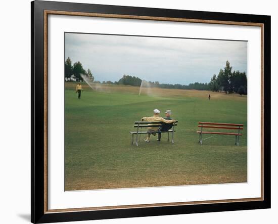 Golfers Sitting on Bench Near Practice Greens While Awaiting Tee Time on Pinehurst Golf Course-Walker Evans-Framed Photographic Print