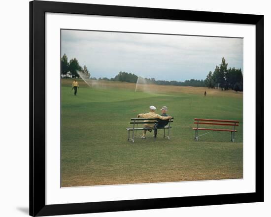 Golfers Sitting on Bench Near Practice Greens While Awaiting Tee Time on Pinehurst Golf Course-Walker Evans-Framed Photographic Print