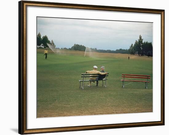 Golfers Sitting on Bench Near Practice Greens While Awaiting Tee Time on Pinehurst Golf Course-Walker Evans-Framed Photographic Print