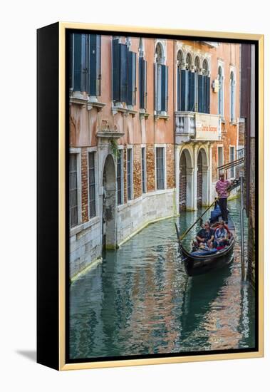 Gondola Boat Passing Through a Narrow Canal, Venice, Veneto, Italy-Stefano Politi Markovina-Framed Premier Image Canvas