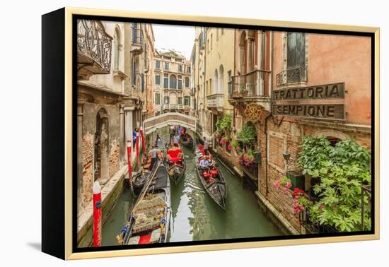 Gondola Traffic in Narrow Canal. Venice. Italy-Tom Norring-Framed Premier Image Canvas