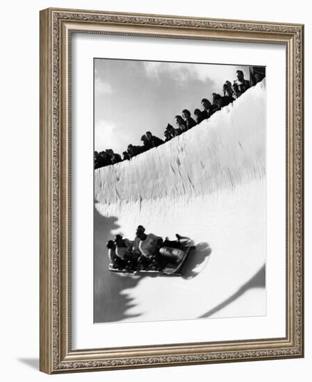 Good of Cresta Run, Bobsled Run, Coasting around Sunny Bend as People Peer from Above the Track-Alfred Eisenstaedt-Framed Photographic Print