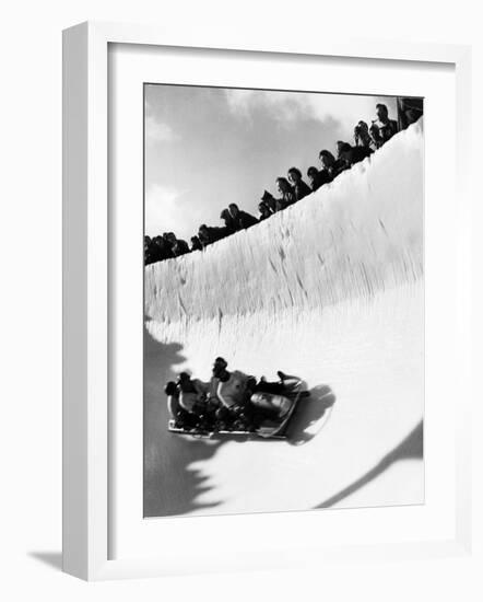 Good of Cresta Run, Bobsled Run, Coasting around Sunny Bend as People Peer from Above the Track-Alfred Eisenstaedt-Framed Photographic Print