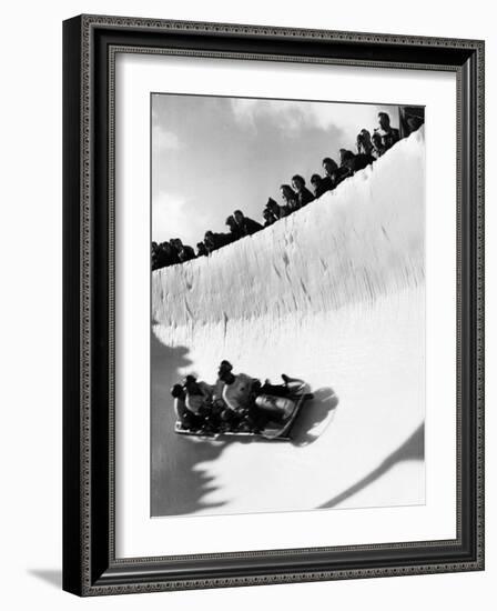 Good of Cresta Run, Bobsled Run, Coasting around Sunny Bend as People Peer from Above the Track-Alfred Eisenstaedt-Framed Photographic Print