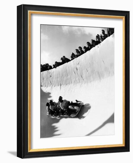 Good of Cresta Run, Bobsled Run, Coasting around Sunny Bend as People Peer from Above the Track-Alfred Eisenstaedt-Framed Photographic Print