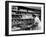 Good of Worker in Bakery Standing in Front of Shelves of Various Kinds of Breads and Rolls-Alfred Eisenstaedt-Framed Photographic Print