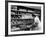 Good of Worker in Bakery Standing in Front of Shelves of Various Kinds of Breads and Rolls-Alfred Eisenstaedt-Framed Photographic Print