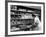 Good of Worker in Bakery Standing in Front of Shelves of Various Kinds of Breads and Rolls-Alfred Eisenstaedt-Framed Photographic Print