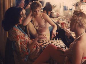 Showgirls Playing Chess Between Shows at Latin Quarter Nightclub by Gordon Parks