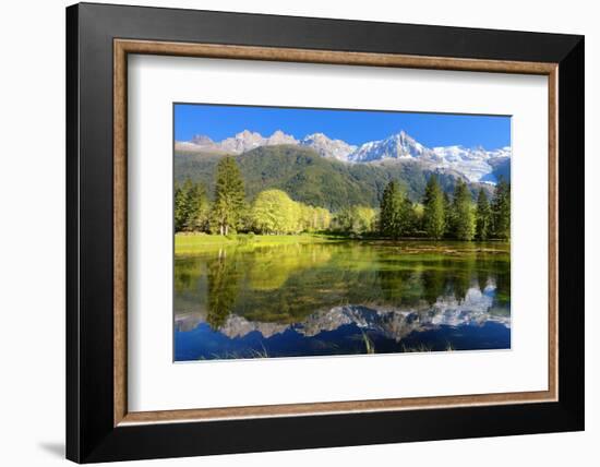 Gorgeous Reflection in the Smooth Water of the Lake in the Park.  Snowy Mountains and Evergreen For-kavram-Framed Photographic Print