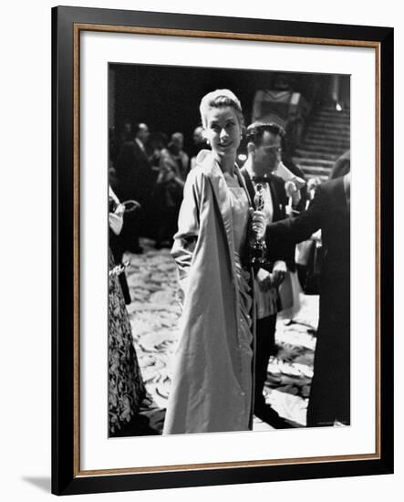 Grace Kelly Holding Her Best Oscar-George Silk-Framed Premium Photographic Print