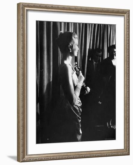 Grace Kelly Holding Her Oscar-George Silk-Framed Premium Photographic Print