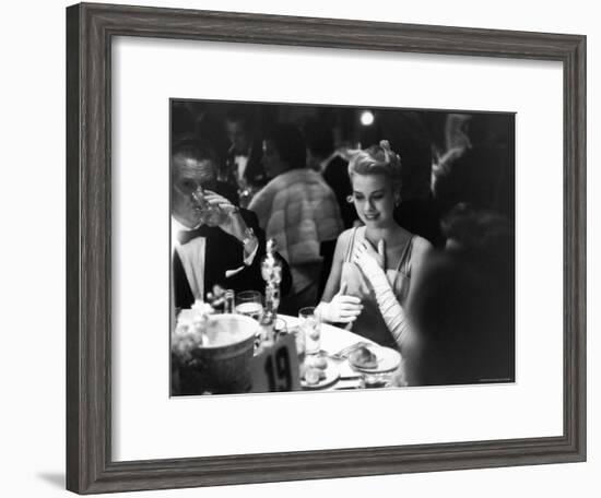 Grace Kelly Sitting at Romanoff's-George Silk-Framed Premium Photographic Print