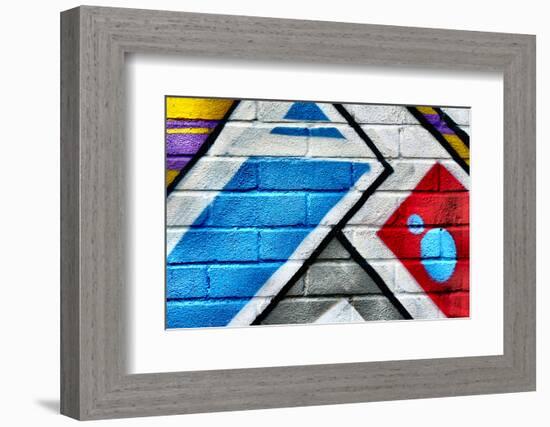 Graffiti Image On Brick Wall-sammyc-Framed Photographic Print