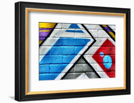 Graffiti Image On Brick Wall-sammyc-Framed Photographic Print