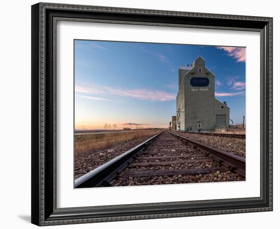 Grain elevator and railroad track, Milk River, Alberta, Canada-null-Framed Photographic Print