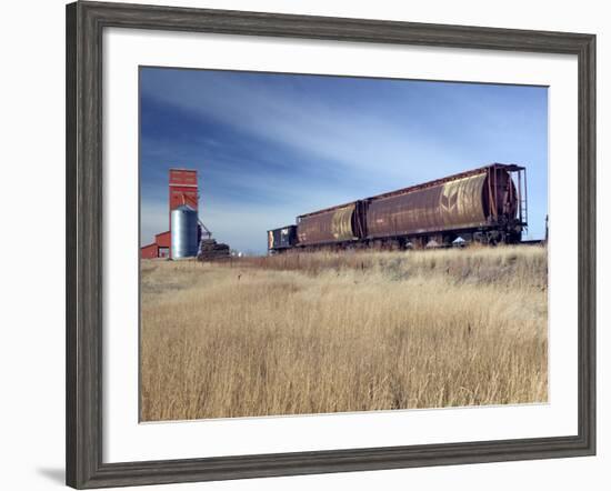 Grain Elevators and Wheat Train, Saskatchewan, Canada-Walter Bibikow-Framed Photographic Print