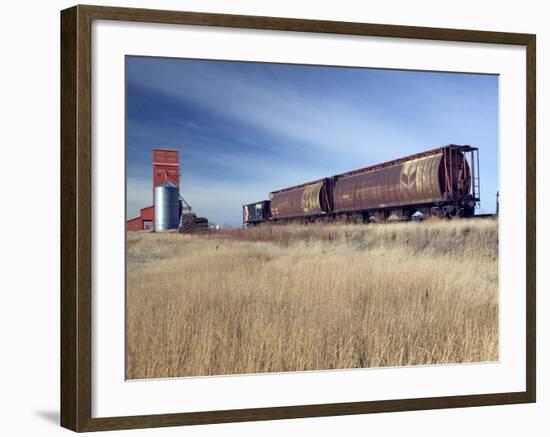 Grain Elevators and Wheat Train, Saskatchewan, Canada-Walter Bibikow-Framed Photographic Print