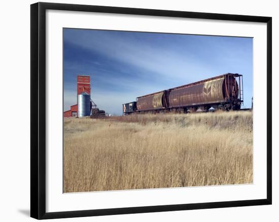 Grain Elevators and Wheat Train, Saskatchewan, Canada-Walter Bibikow-Framed Photographic Print