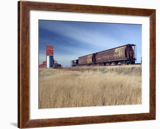 Grain Elevators and Wheat Train, Saskatchewan, Canada-Walter Bibikow-Framed Photographic Print