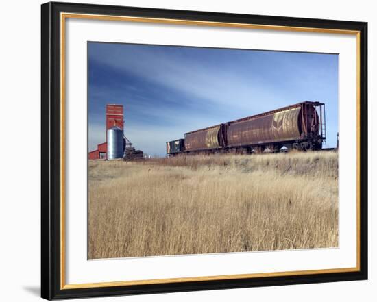 Grain Elevators and Wheat Train, Saskatchewan, Canada-Walter Bibikow-Framed Photographic Print