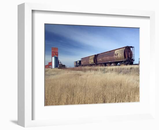Grain Elevators and Wheat Train, Saskatchewan, Canada-Walter Bibikow-Framed Photographic Print