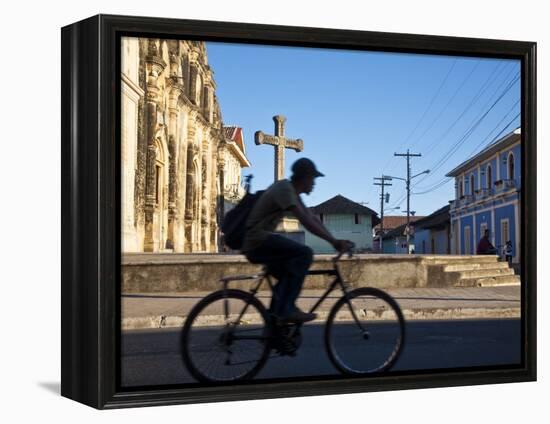 Granada, Man Riding Bike Past Iglesia De La Merced, Nicaragua-Jane Sweeney-Framed Premier Image Canvas