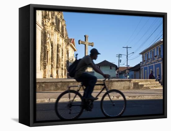 Granada, Man Riding Bike Past Iglesia De La Merced, Nicaragua-Jane Sweeney-Framed Premier Image Canvas