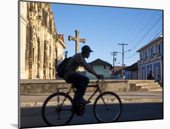 Granada, Man Riding Bike Past Iglesia De La Merced, Nicaragua-Jane Sweeney-Mounted Photographic Print