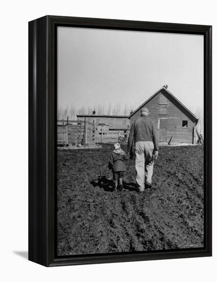 Grandpa and 4 Year Old Granddaughter, on Morning Chores, to Feed Pigs on Nearby Lot-Gordon Parks-Framed Premier Image Canvas
