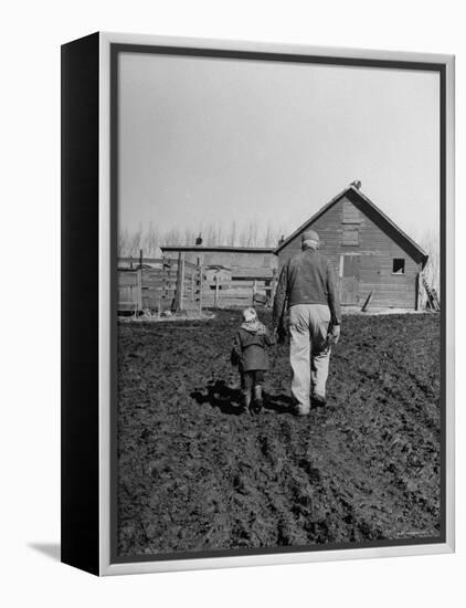 Grandpa and 4 Year Old Granddaughter, on Morning Chores, to Feed Pigs on Nearby Lot-Gordon Parks-Framed Premier Image Canvas