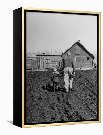 Grandpa and 4 Year Old Granddaughter, on Morning Chores, to Feed Pigs on Nearby Lot-Gordon Parks-Framed Premier Image Canvas