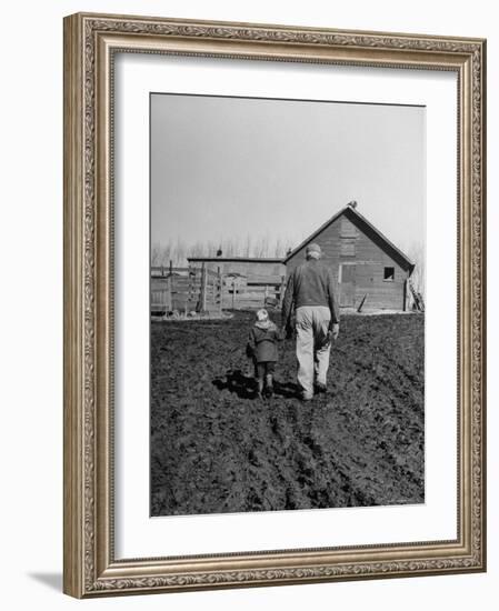 Grandpa and 4 Year Old Granddaughter, on Morning Chores, to Feed Pigs on Nearby Lot-Gordon Parks-Framed Photographic Print