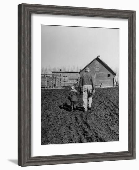 Grandpa and 4 Year Old Granddaughter, on Morning Chores, to Feed Pigs on Nearby Lot-Gordon Parks-Framed Photographic Print