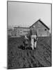 Grandpa and 4 Year Old Granddaughter, on Morning Chores, to Feed Pigs on Nearby Lot-Gordon Parks-Mounted Photographic Print