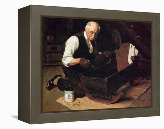 Grandpa’s Gift (or Grandfather Varnishing the Cradle; Up in the Garret)-Norman Rockwell-Framed Premier Image Canvas