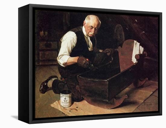 Grandpa’s Gift (or Grandfather Varnishing the Cradle; Up in the Garret)-Norman Rockwell-Framed Premier Image Canvas