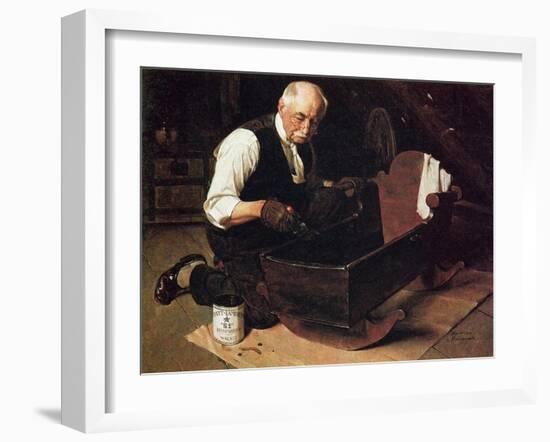 Grandpa’s Gift (or Grandfather Varnishing the Cradle; Up in the Garret)-Norman Rockwell-Framed Giclee Print