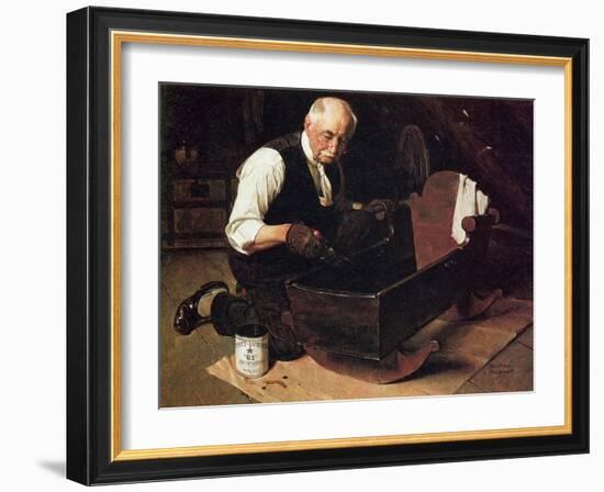 Grandpa’s Gift (or Grandfather Varnishing the Cradle; Up in the Garret)-Norman Rockwell-Framed Giclee Print