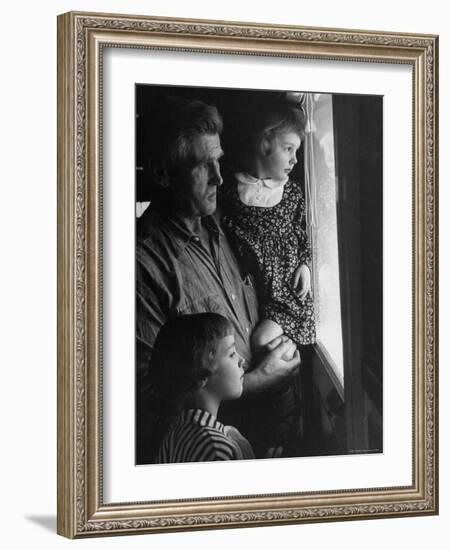 Grandpa with Grandchildren, Looking Out Kitchen Door, to a View He's Always Loved-Gordon Parks-Framed Photographic Print