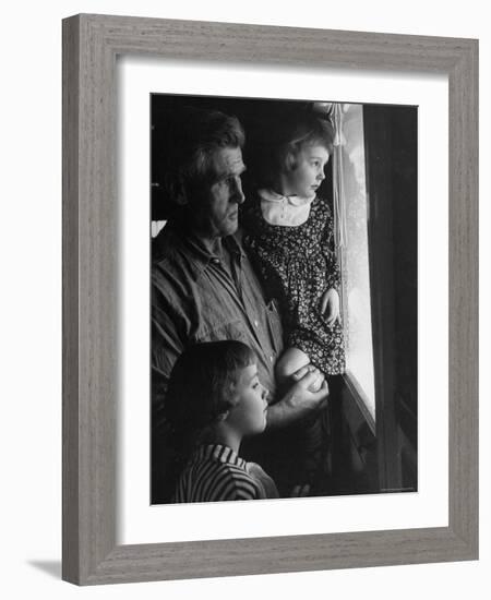 Grandpa with Grandchildren, Looking Out Kitchen Door, to a View He's Always Loved-Gordon Parks-Framed Photographic Print