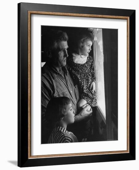 Grandpa with Grandchildren, Looking Out Kitchen Door, to a View He's Always Loved-Gordon Parks-Framed Photographic Print