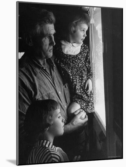 Grandpa with Grandchildren, Looking Out Kitchen Door, to a View He's Always Loved-Gordon Parks-Mounted Photographic Print