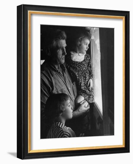 Grandpa with Grandchildren, Looking Out Kitchen Door, to a View He's Always Loved-Gordon Parks-Framed Photographic Print