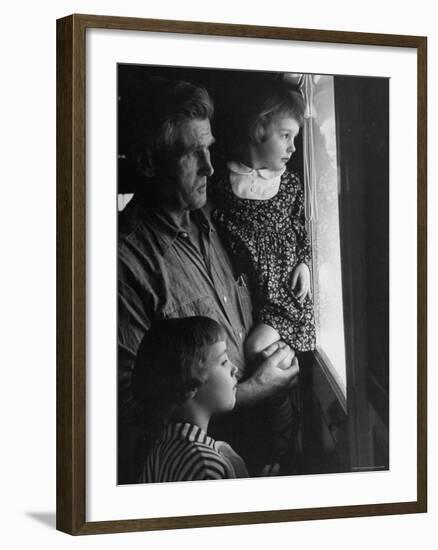 Grandpa with Grandchildren, Looking Out Kitchen Door, to a View He's Always Loved-Gordon Parks-Framed Photographic Print